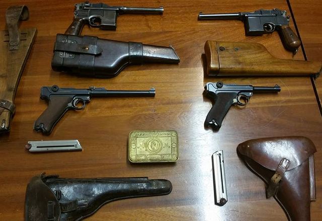 Collectable firearms on a table